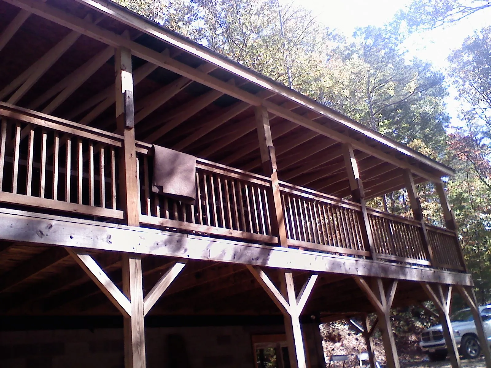 Timber framing under a new elevated porch and deck — Roof Leak Repair in Crowley by Roofing Brothers
